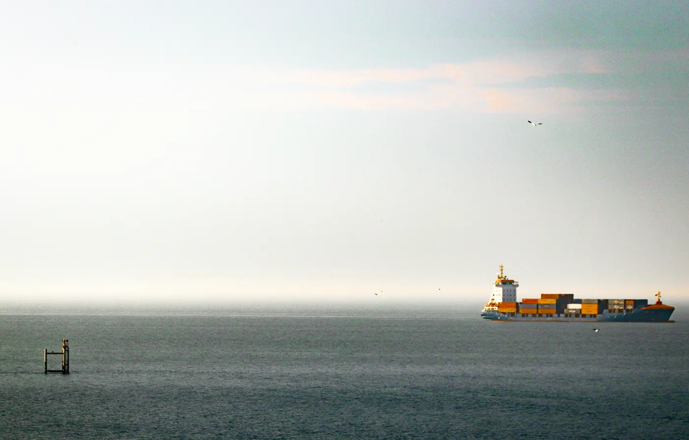 Ocean cargo vessel at sea — Detroit 3PL international freight forwarding and global shipping coordination